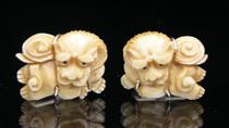 Appraisal: Pair of Foo Dog Cuff Links Paris of carved ivory