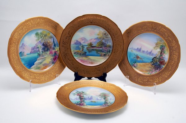 Appraisal: Set of four handpainted scenic plates each featuring a view