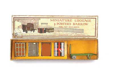 Appraisal: Hornby O Gauge Railway accessories miniature luggage and porter barrow