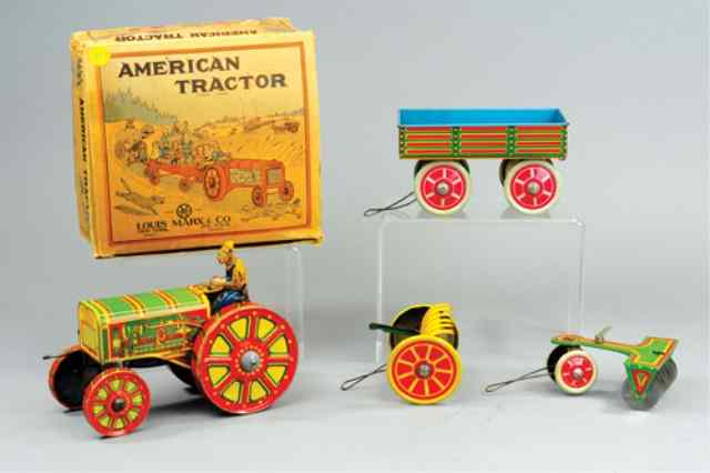 Appraisal: MARX BOXED ''AMERICAN'' TRACTOR SET Lithographed tin set includes key