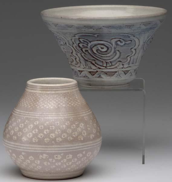 Appraisal: ARTHUR BAGGS Two vases covered in ivory and beige glaze