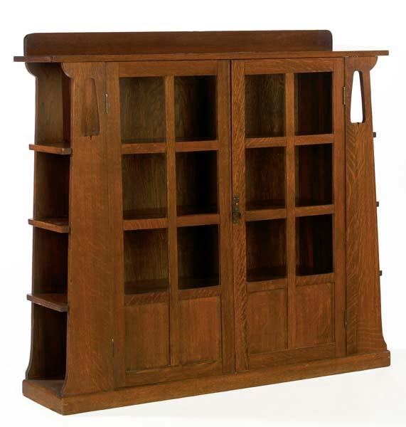 Appraisal: LIMBERT Two-door bookcase no with cut-out sides and three adjustable