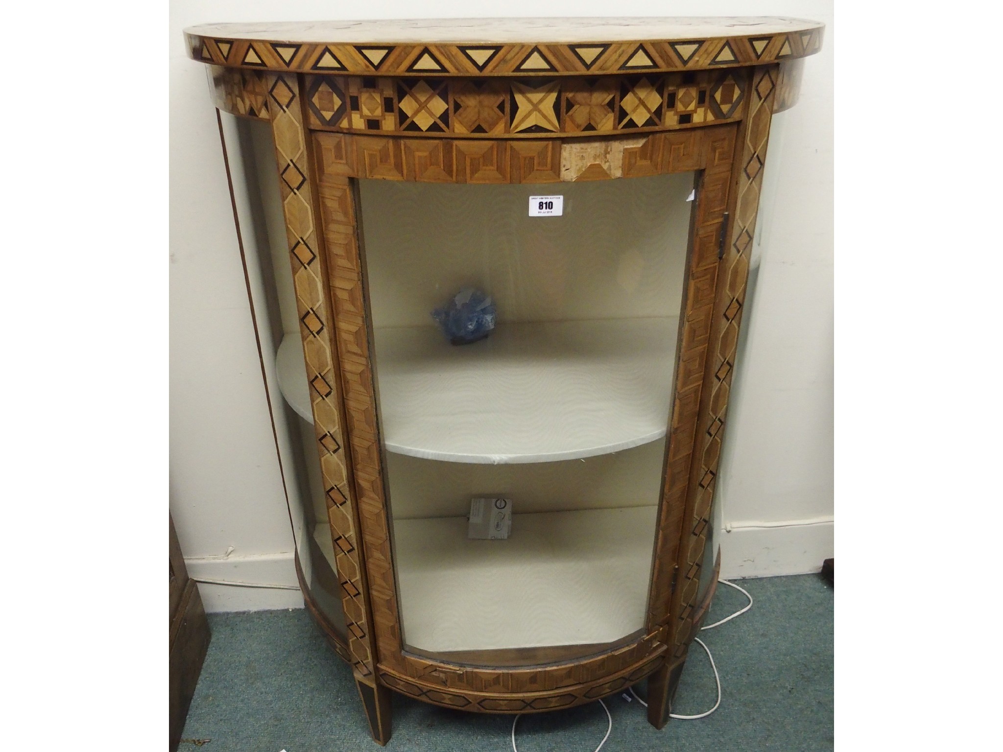 Appraisal: A th Century glazed marquetry bow front inlaid display cabinet