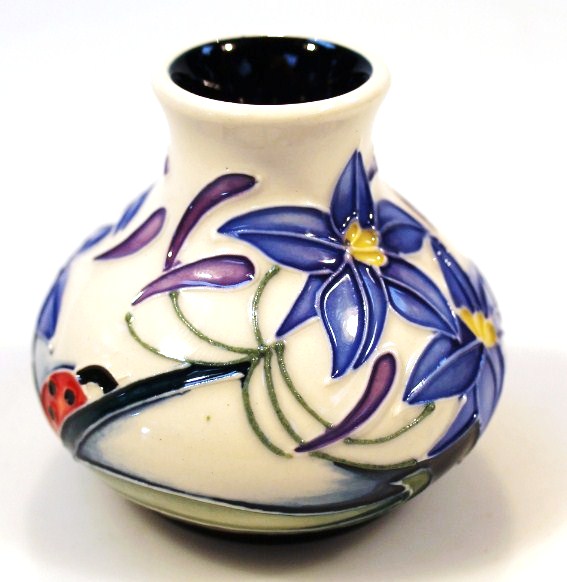 Appraisal: A Moorcroft Fly Away Home Series Cornflower and Ladybird squat