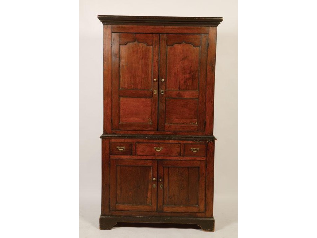 Appraisal: A GEORGE III OAK CUPBOARD the upper section with a