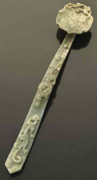 Appraisal: Chinese Qing carved celadon jade ruyi scepterdepicting chi-dragons ''L Circa