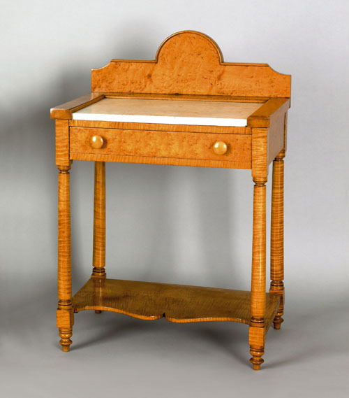 Appraisal: Pennsylvania Sheraton curly maple washstand th c with an arched