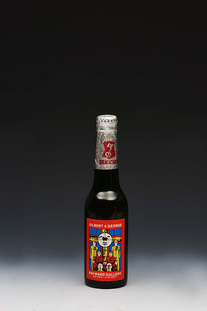 Appraisal: Gilbert George for BecksA Becks beer bottle with Gilbert George