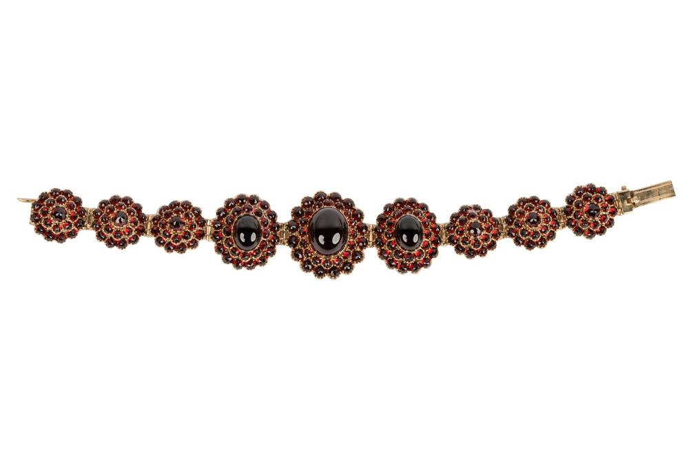 Appraisal: KARAT YELLOW GOLD GARNET VICTORIAN-STYLE BRACELETcontaining three oval cabochon cut