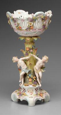 Appraisal: Porcelain center bowl central tree with dancing nymphs supporting a