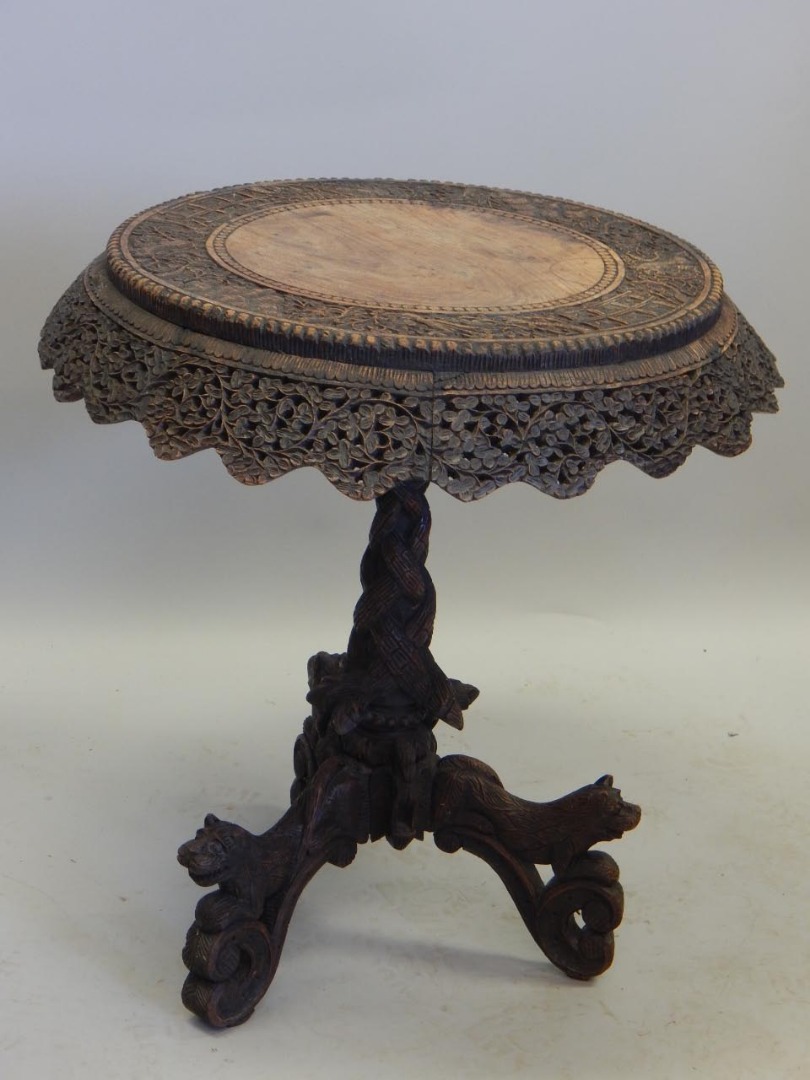 Appraisal: A thC Burmese occasional table the circular top with a