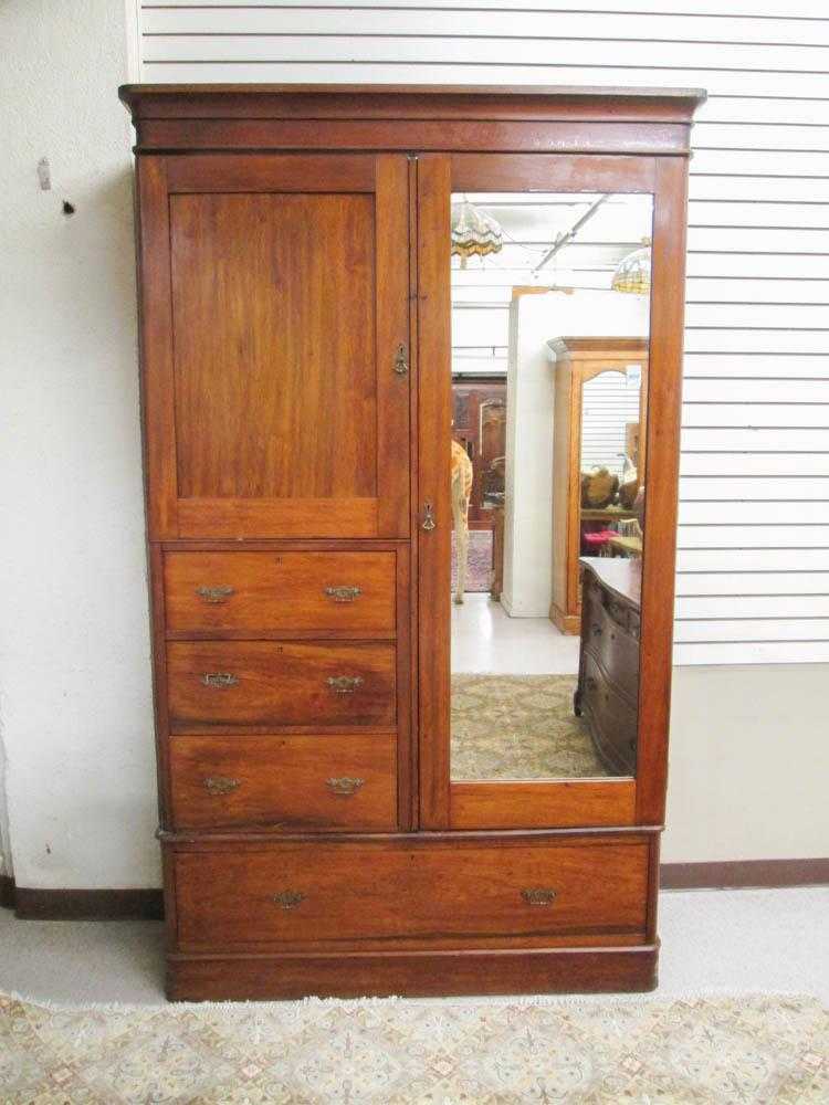 Appraisal: VICTORIAN MAHOGANY WARDROBE English th century the front featuring two