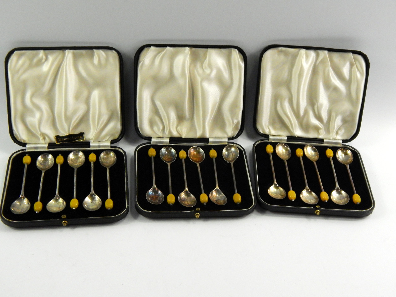 Appraisal: Three sets of Edward VIII silver coffee spoons with coffee