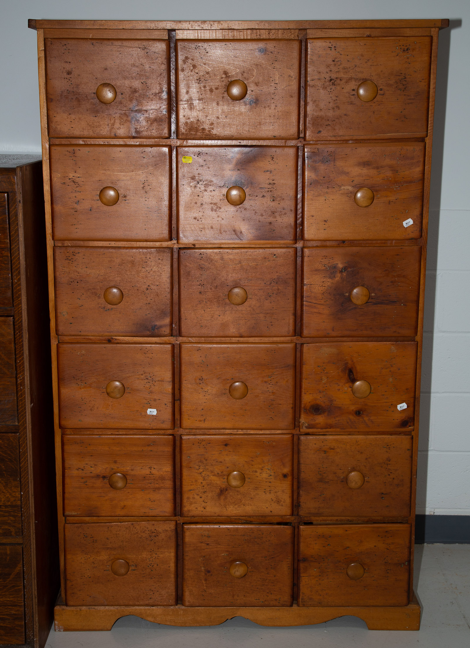 Appraisal: VERNACULAR STYLE PINE -DRAWER STORAGE CHEST Bench-made mid th century