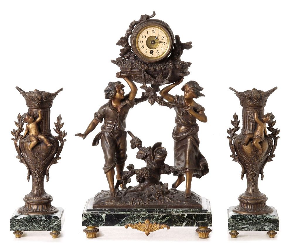 Appraisal: A FRENCH CLOCK GARNITURE WITH STATUE AFTER MOREAU The patinated