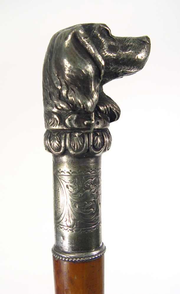 Appraisal: Victorian walking cane with silver plated hunting dog's head handle