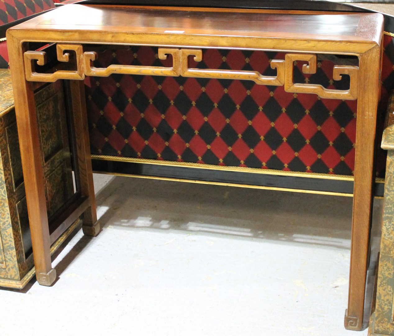 Appraisal: A th century Chinese hardwood altar table with cloud carved