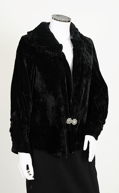 Appraisal: A s s black velvet jacket large collar long sleeves