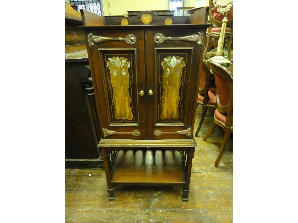 Appraisal: A good quality Arts Crafts mahogany music cabinet attributed to