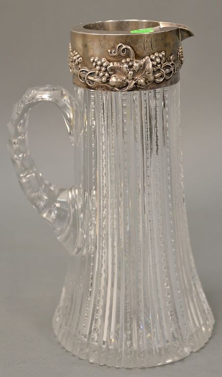 Appraisal: Cut glass pitcher with sterling silver top chipped ht in