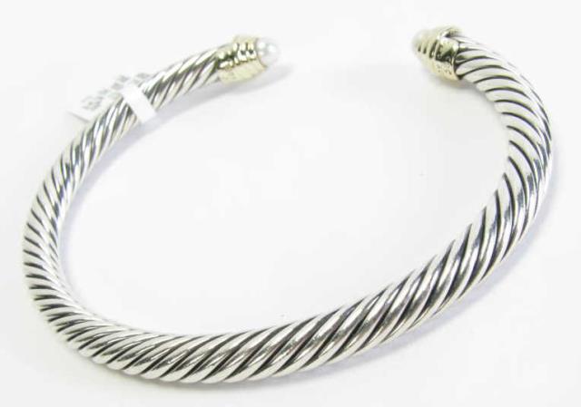 Appraisal: A K yellow gold and sterling silver David Yurman cable