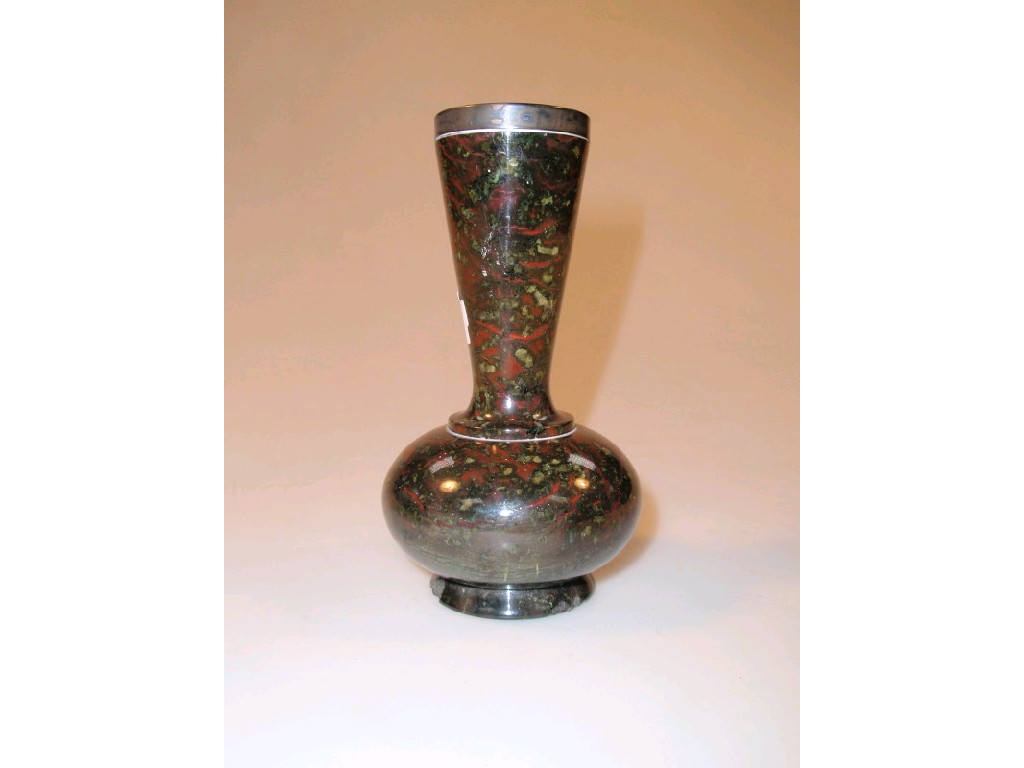 Appraisal: A Victorian serpentine stone small vase of compressed circular form