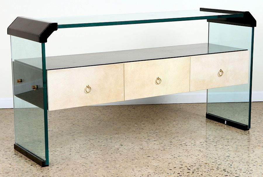 Appraisal: GLASS AND EBONIZED CONSOLE TABLE CIRCA A mid century modern