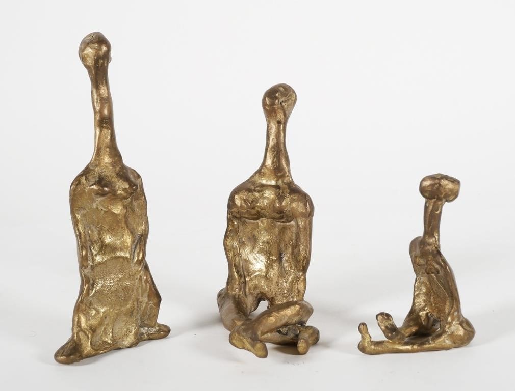 Appraisal: Three interesting freeform amorphous human figures in bronze each with