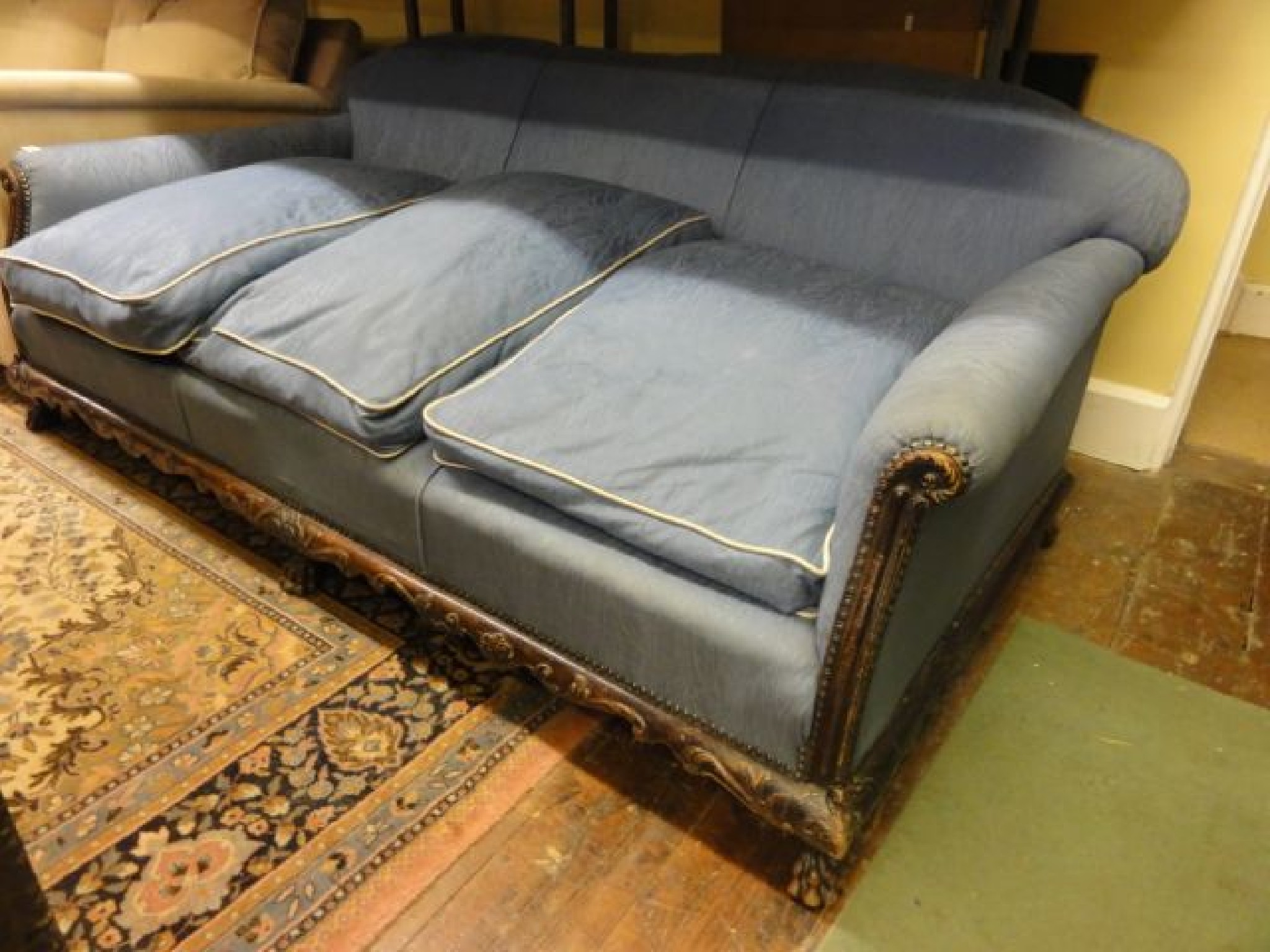 Appraisal: An Edwardian drawing room sofa with deep seat low back