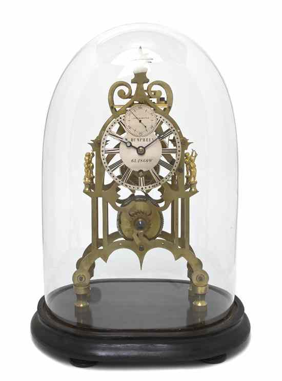 Appraisal: A Scottish Brass Skeleton Clock W Humphreys of pierced scrolling