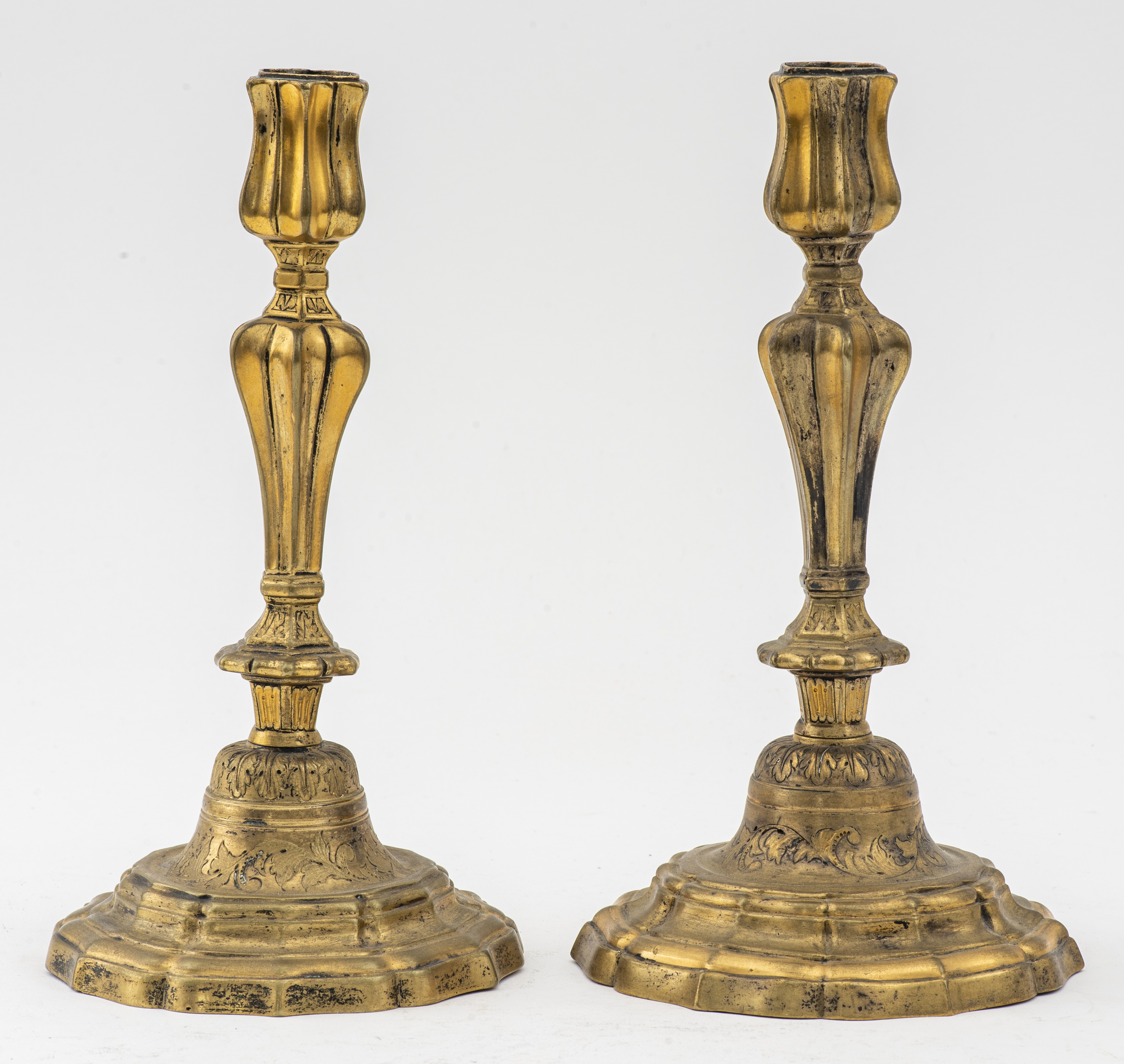 Appraisal: BAROQUE GILT BRASS CANDLESTICKS PAIR Baroque pair of gilt brass