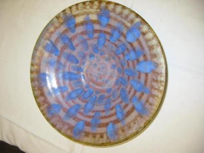 Appraisal: A ROYAL DOULTON STONEWARE BOWL of shallow circular form painted