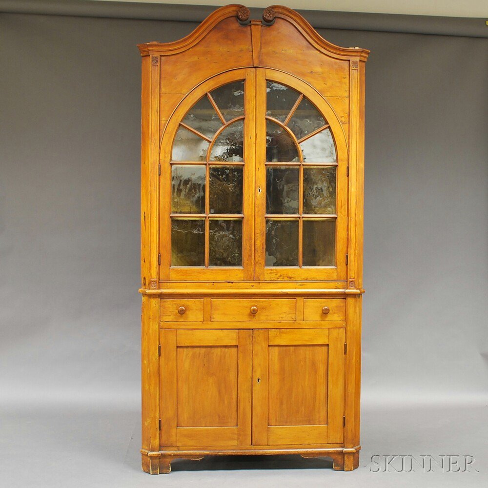 Appraisal: Country Carved Pine Two-part Corner Cupboard America th century the