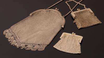 Appraisal: A lady's white metal chain mail evening bag and two