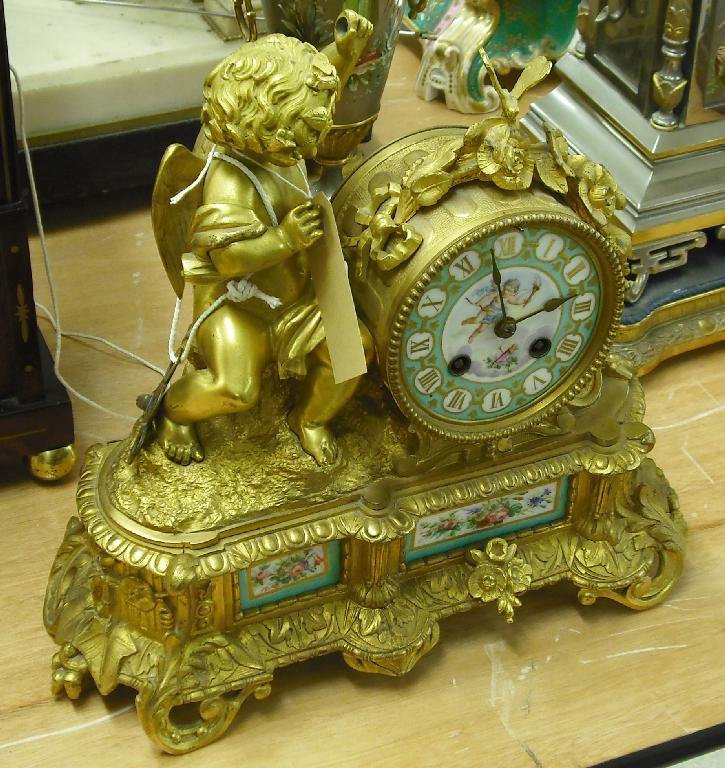 Appraisal: French ormolu and porcelain two train mantel clock the movement