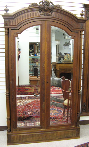 Appraisal: LOUIS XVI STYLE MAHOGANY ARMOIRE French c with carved and