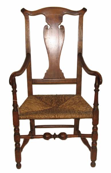 Appraisal: An American maple and rush seat armchair height in width