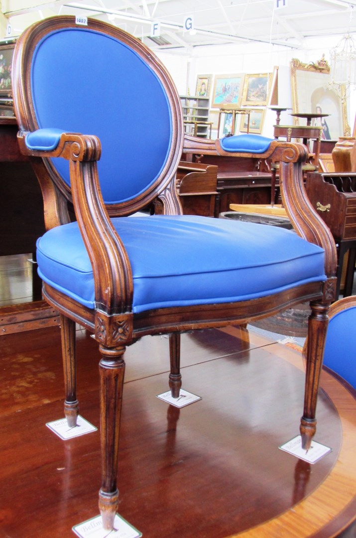 Appraisal: A set of seventeen Louis XVI style stained beech oval