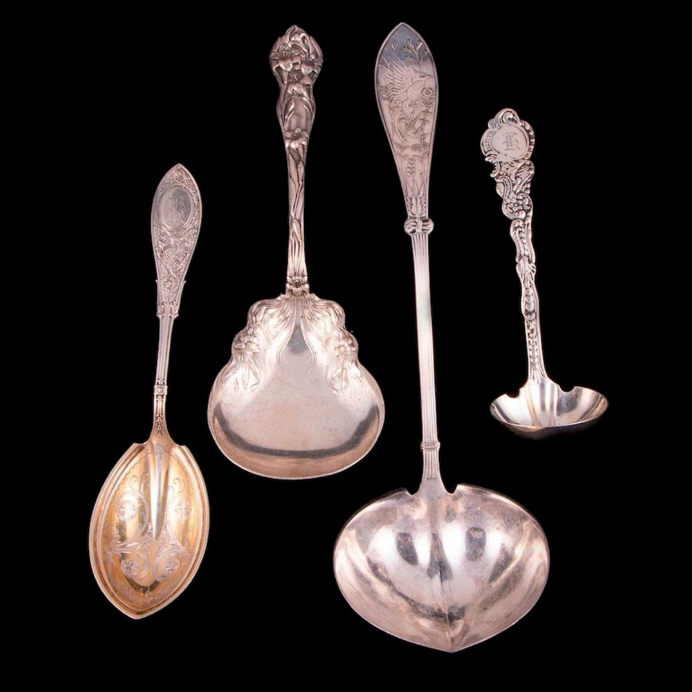 Appraisal: Four sterling serving spoons Four Victorian sterling serving spoons largest