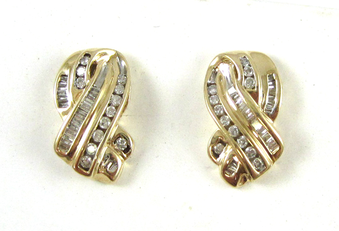 Appraisal: PAIR OF DIAMOND AND TEN KARAT GOLD EARRINGS Each yellow