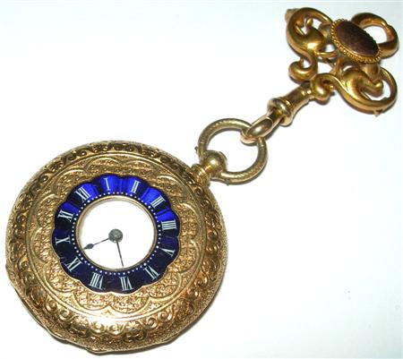 Appraisal: A gold half-hunter pocket watch the white enamel dial with