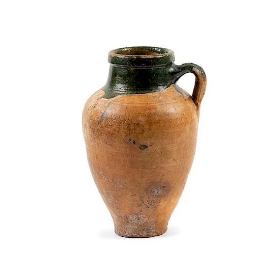 Appraisal: An Islamic Green Glazed Pottery Vessel Height inches An Islamic