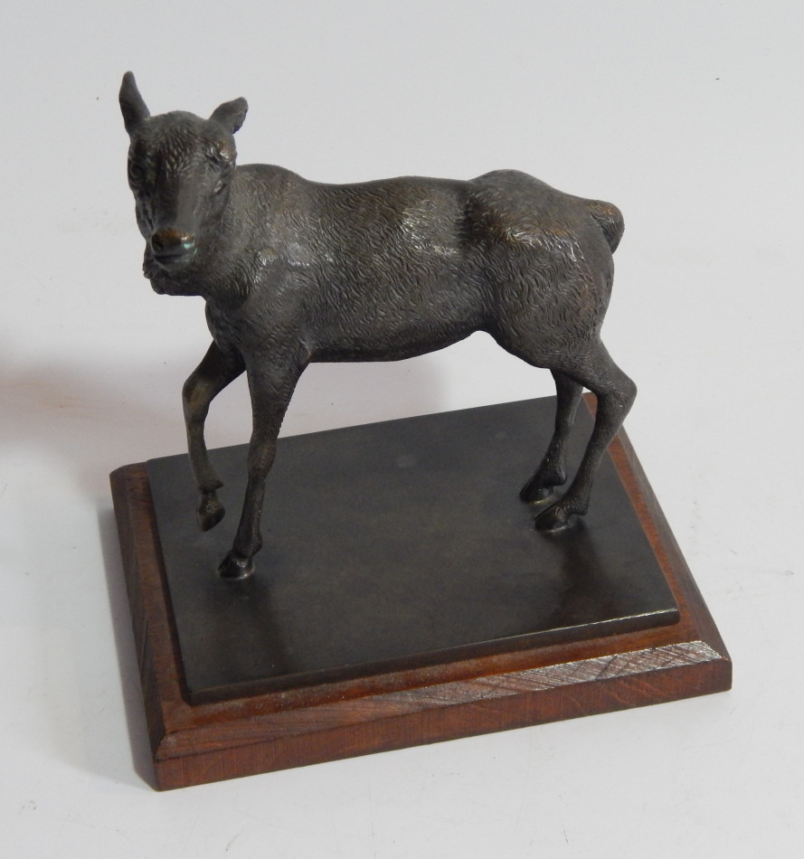 Appraisal: A bronze model of a goat in a standing pose