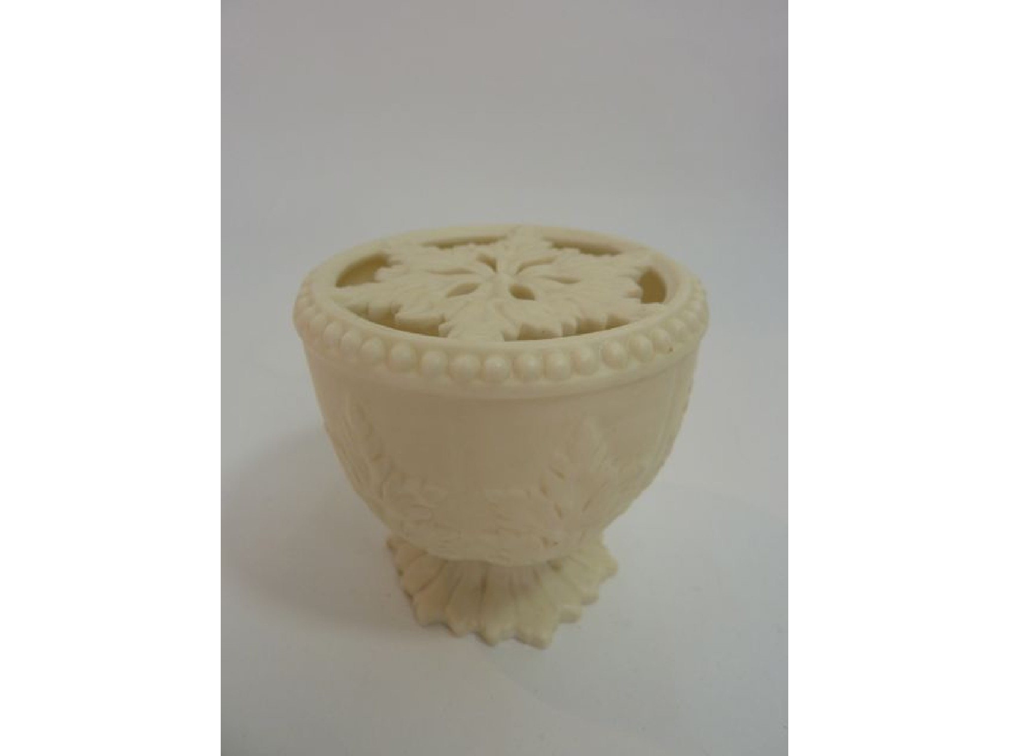 Appraisal: A Grainger's Worcester ivory coloured small vase with moulded acanthus