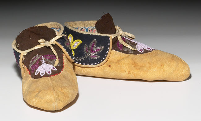 Appraisal: Algonquin moccasins pair brain-tanned hide with a colorful beaded design