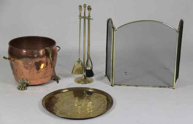 Appraisal: A set of three brass fire irons on stand a