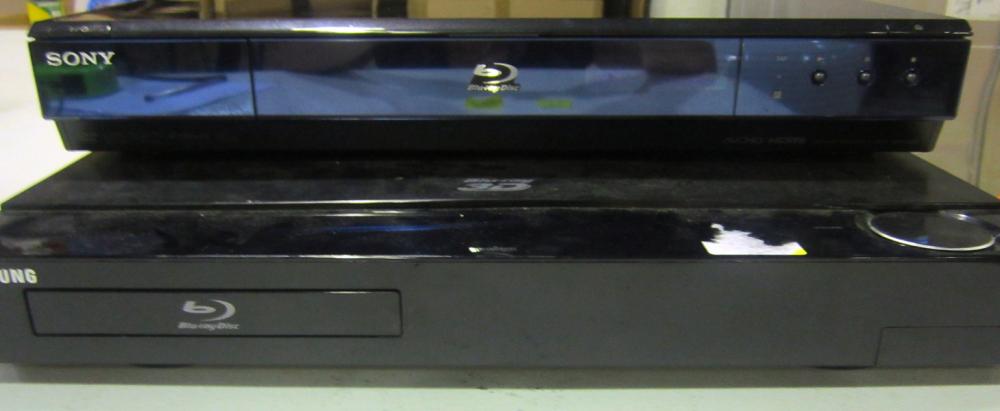 Appraisal: TWO BLUE RAY DVD PLAYERS SAMSUNG SONY ONE WITHOUT POWER