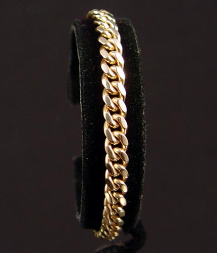 Appraisal: ITALIAN K CUBAN LINK BRACELET Square clasp with safety chain