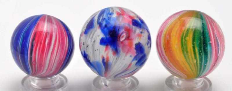 Appraisal: Lot of Onionskin Marbles Description Includes one marble with white