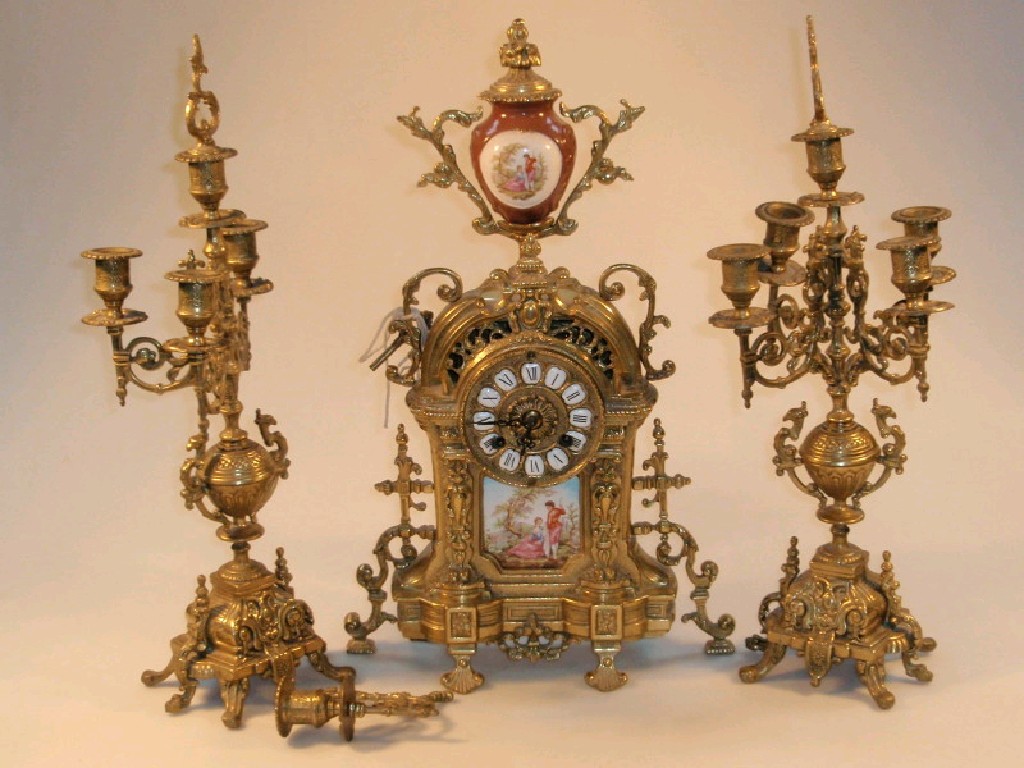 Appraisal: An early thC German gilt brass clock garniture of eight